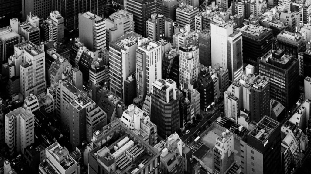Aerial view of dense modern city buildings