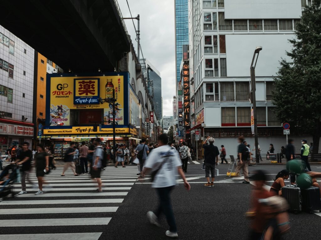 Crowded city street showing modern urban life
